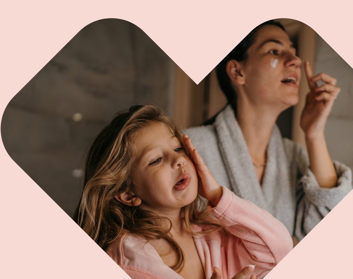 A mother and daughter start their skin-care routines together.